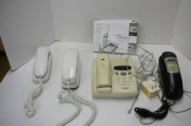 lot 222 image: 3 Wall Phones, 1 Uniden Cordless With Answering Machine Phone