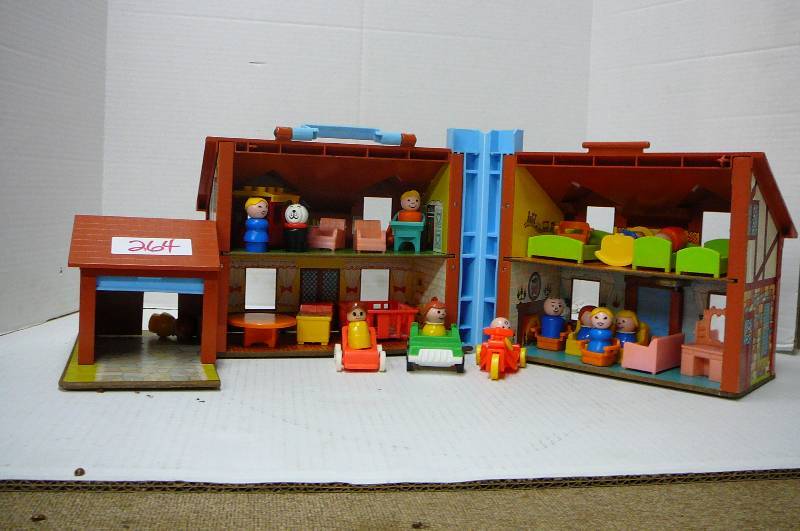 lot 264 image: Fisher Price Playhouse with many pieces