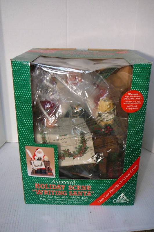 lot 293 image: Holiday Scene Writing Santa animated WORKS and plays Christmas Carols 14w x 11d x 18t