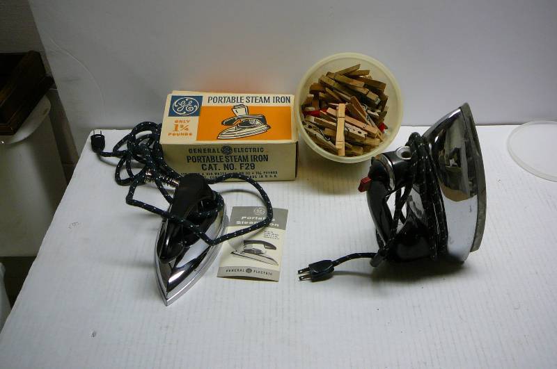 lot 318 image: 2 Irons, Tub of Clothes Pins