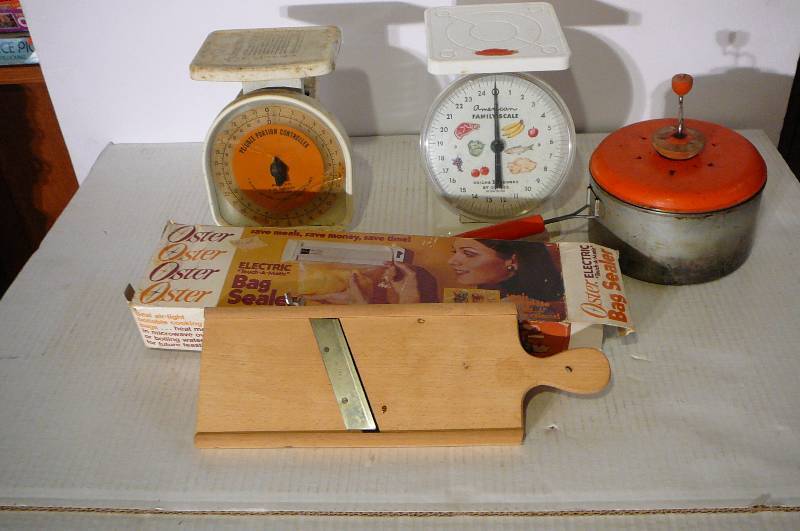 lot 368 image: 2 Large Food Scales, Stovetop Popcorn maker, Electric Oster Bag Sealer, Cabbage Slicer Wooden