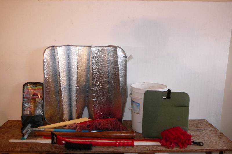 lot 402 image: Windshield Sun screen, Snow Brush, Seat Pad, Longhandle squeegy, California car dusters