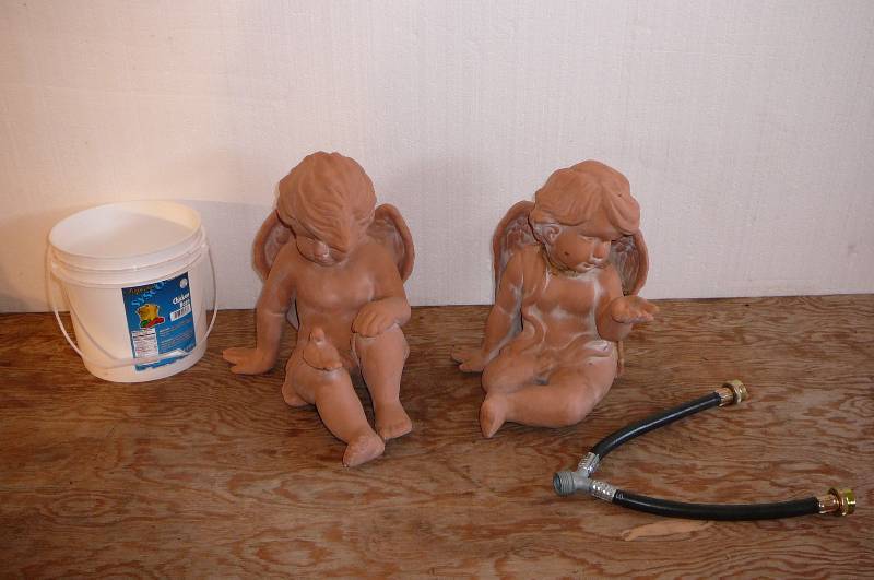 lot 406 image: Outdoor Figurines 12 High Bucket, Hose connect