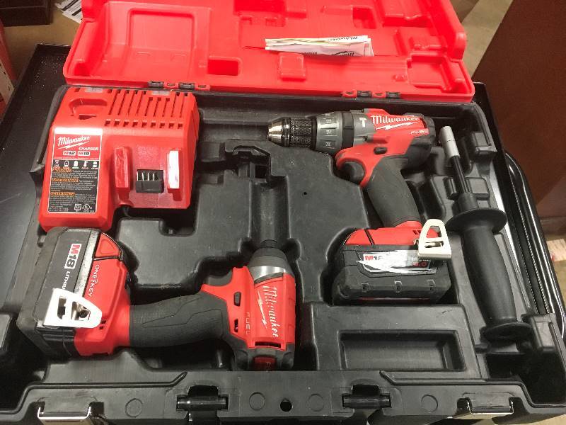 Milwaukee M18 Fuel One-Key 18-Volt Lithium-Ion Brushless Cordless Hammer Drill Impact Driver Combo Kit used in working condition