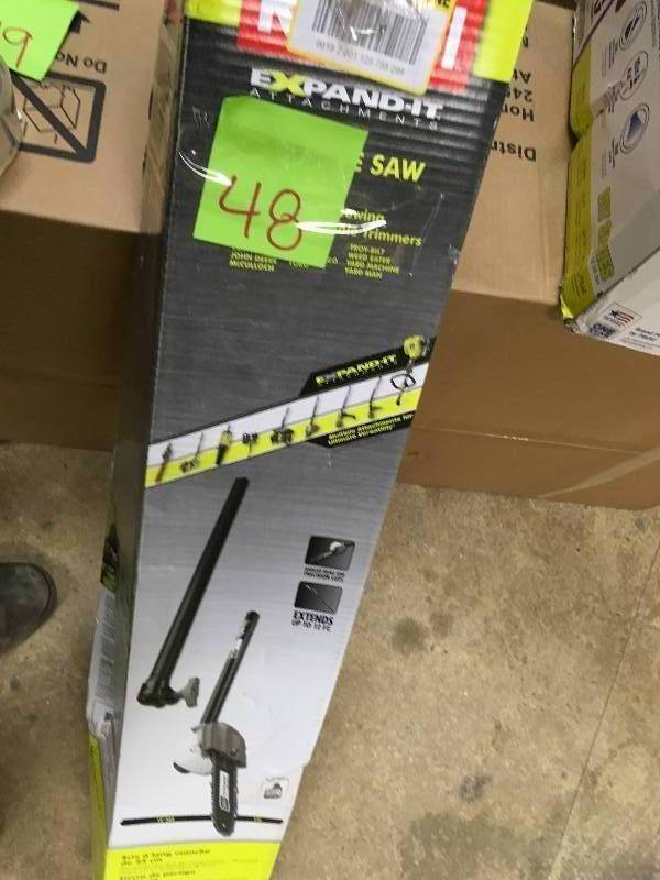 Ryobi Expand-it 10 Pole Saw Attachment in working conditions
