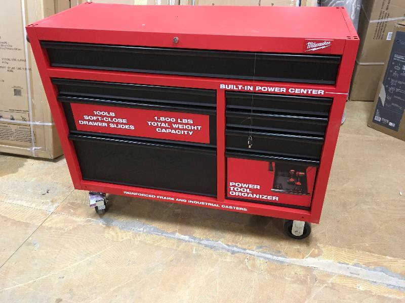 Milwaukee 46 in. Rolling Steel Storage Cabinet not used whit small damage please review the pictures