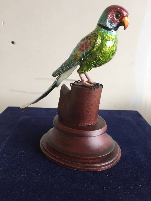 lot 71 image: Enamel Parrot Plum Head Statue