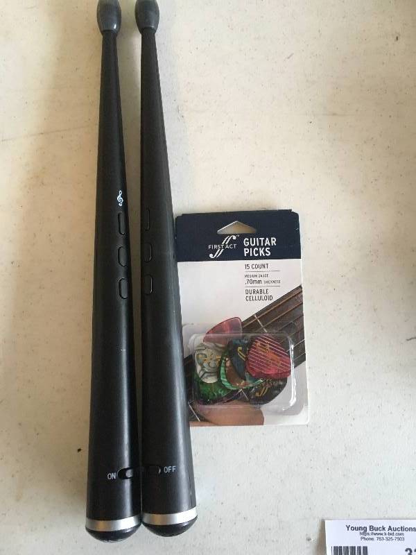 lot 321 image: Electronic Drum Sticks & Guitar Picks