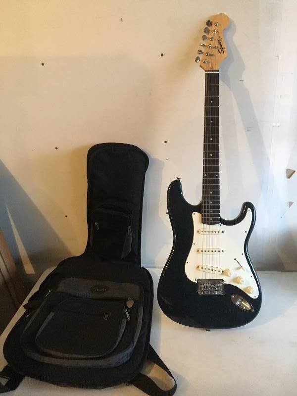 lot 11 image: Fender Squire Guitar & Bag