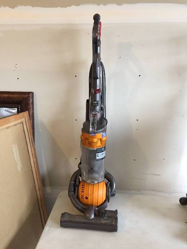 lot 1 image: DYSON DC 25 Vacuum - Orange