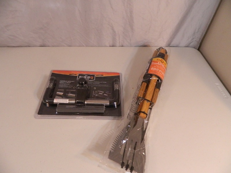 lot 90 image: New BBQ Tool Set and New Light