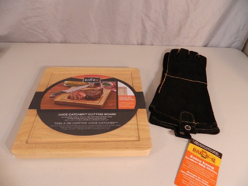 lot 104 image: New Juice Catcher Cutting Board and New Leather Gloves