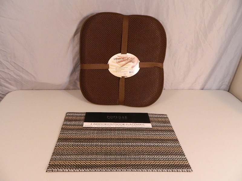 lot 200 image: 2 New Memory Foam Chair Cushions and New Placemats
