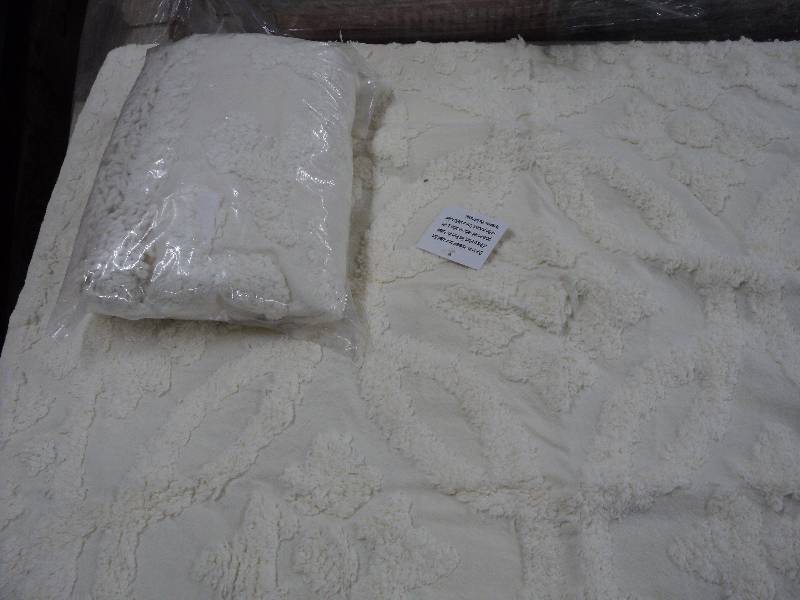2 cream colored pillow shams...