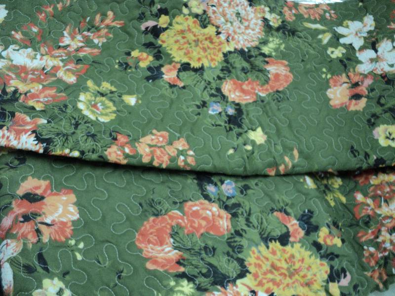 Green floral quilt size 68x 68...
