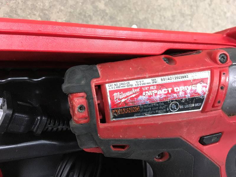 Milwaukee M12 Fuel 12 Volt Lithium - Ion Brushless Cordless 14 in Hex Impact Driver with Free PACKOUT Case In working conditions