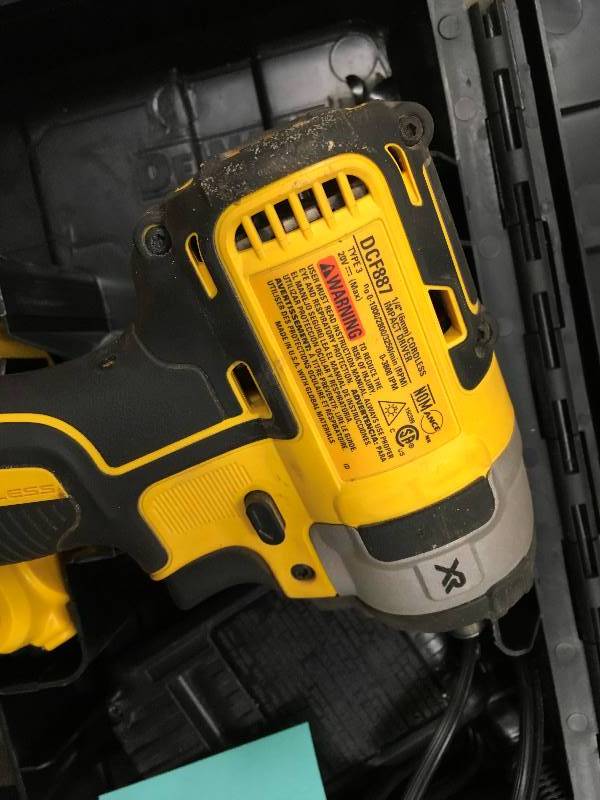 lot 71 image: DeWalt 20 Volt MAX XR Lithium-Ion Cordless Brushless 3-Speed 14 in. Impact Driver in working conditions