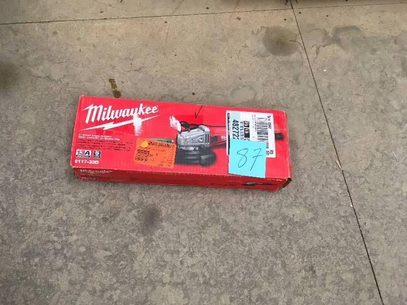 lot 87 image: Milwaukee 5-in 13 Amp Slide Switch Small Angle Grinder with Lock-On and Dial Speed In working conditions