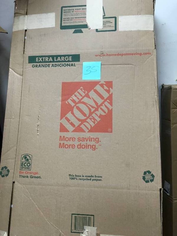 lot 35 image: The Home Depot 24 in. L x 24 in. W x 44 in. D Heavy Duty Tall Wardrobe Box with Metal Hanging Bar in good conditions