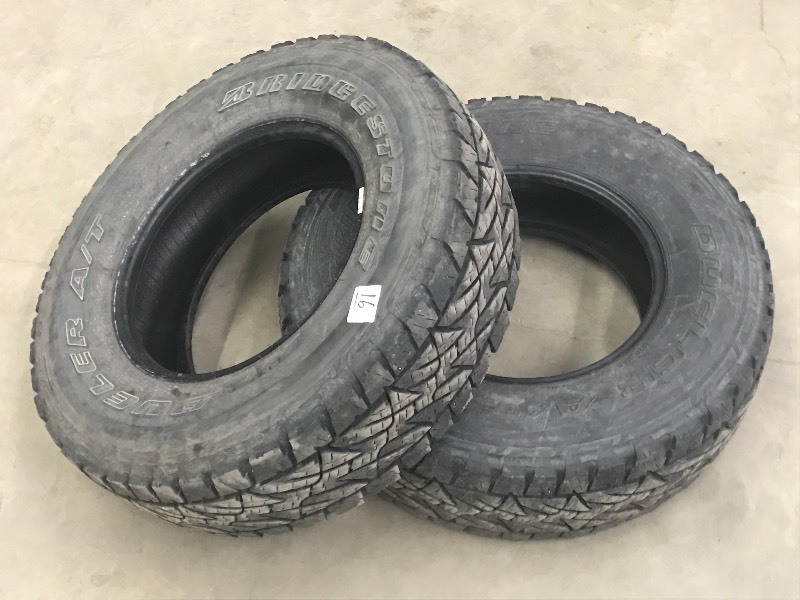 lot 16 image: (2) Bridgestone Dueler LT2457516 ...