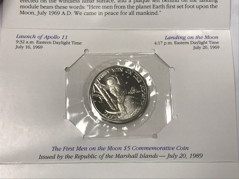 first man on the moon $5 commemorative coin