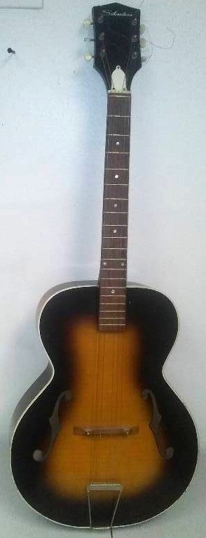 lot 37 image: Silvertone Acoustic Guitar, Missing a string, Excellent Condition, 42 in. length