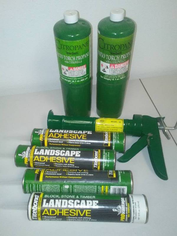 lot 50 image: Patio Torch Propane and adhesive