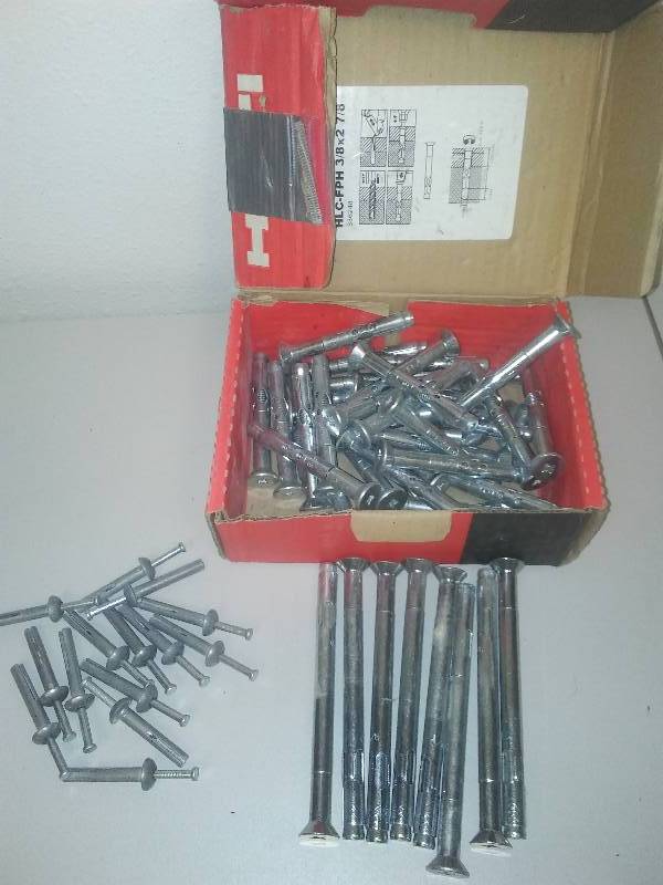 lot 57 image: Hilti Grip Cement Bolt System and Nails