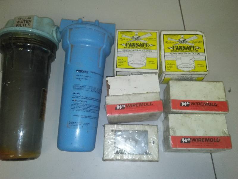 lot 63 image: 2 Omni Water Filters and 7 Electrical Boxes