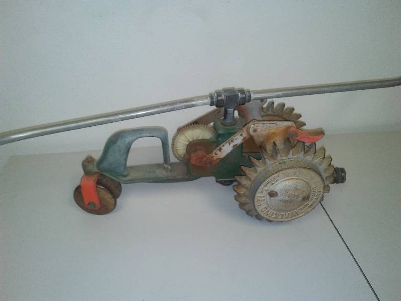 lot 128 image: Walking Tractor Sprinkler, Great Steam punk