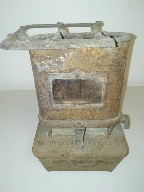 lot 132 image: Antique Cast Heater