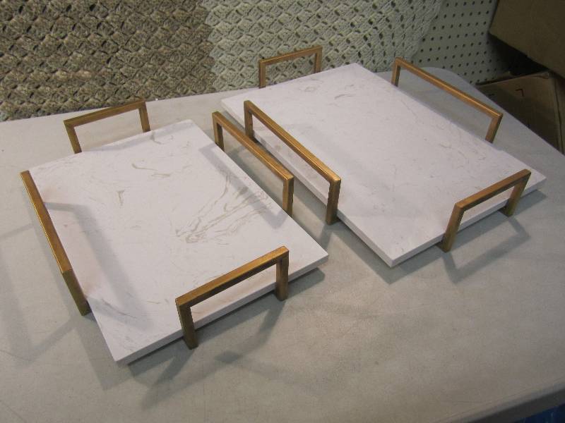 lot 61 image: Pair of Faux Marble ServingHot Pla...