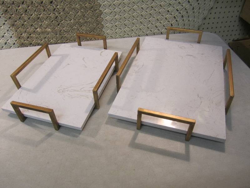 lot 62 image: Pair of Faux Marble ServingHot Pla...