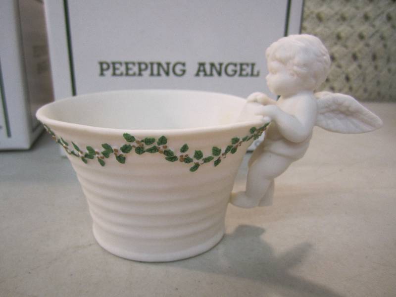 lot 67 image: Lot of 4 Peeping Angel Candle Holde...