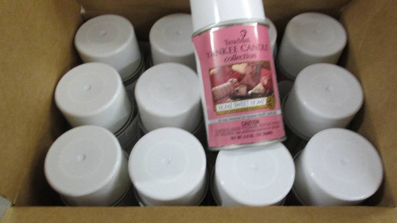 lot 105 image: Case of 12 Time Mist Yankee Candle ...