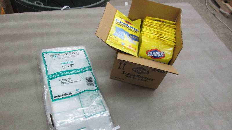 lot 259 image: Cash transmittal bags, Clorox Scub ...