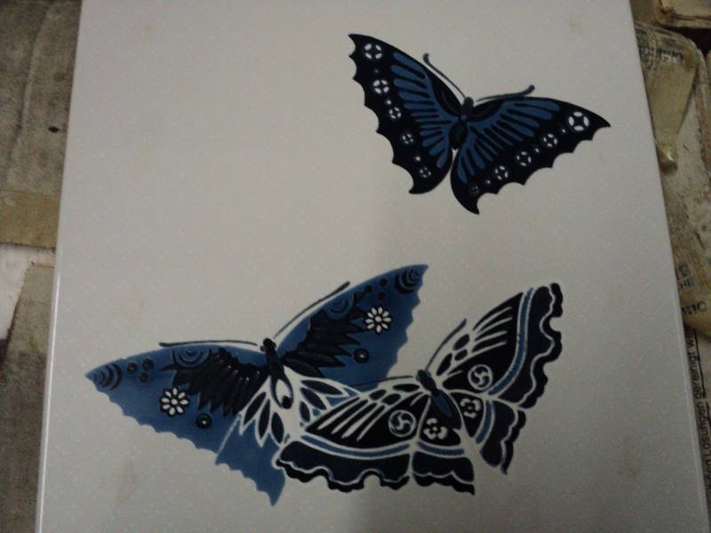 lot 41 image: butterfly patterned tile from Italy...