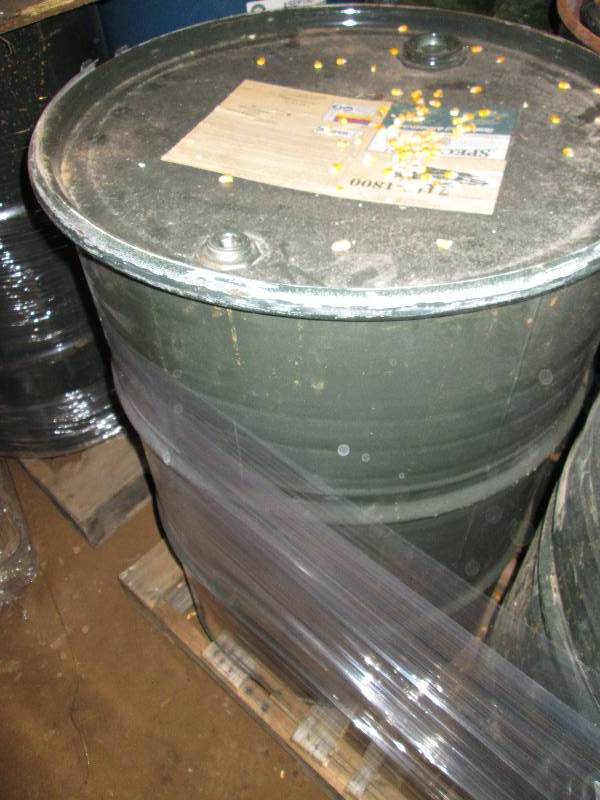 lot 40 image: Metal drum filled with dried corn, ...