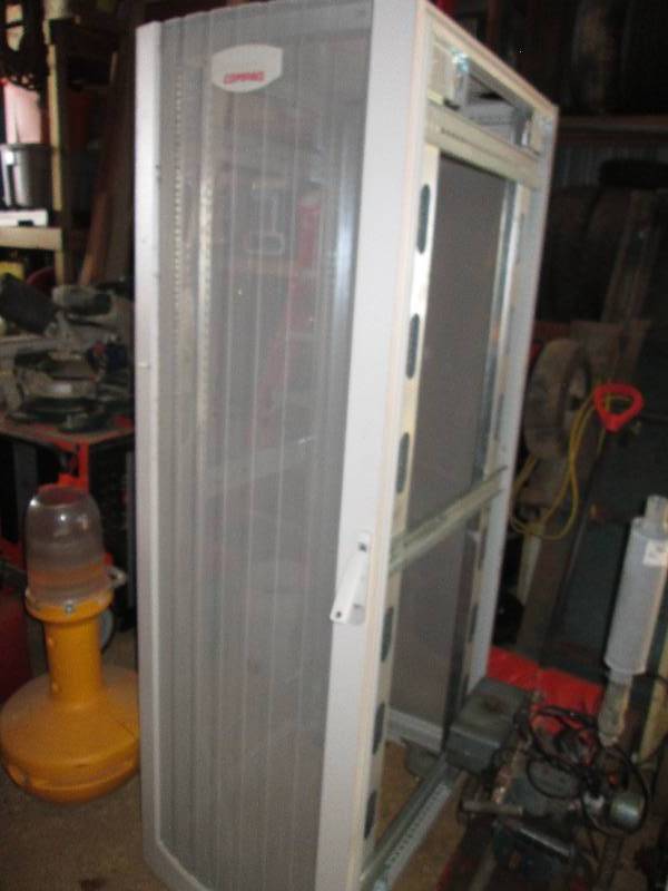 lot 46 image: Conpaq server tower, 6.5 feet tall ...