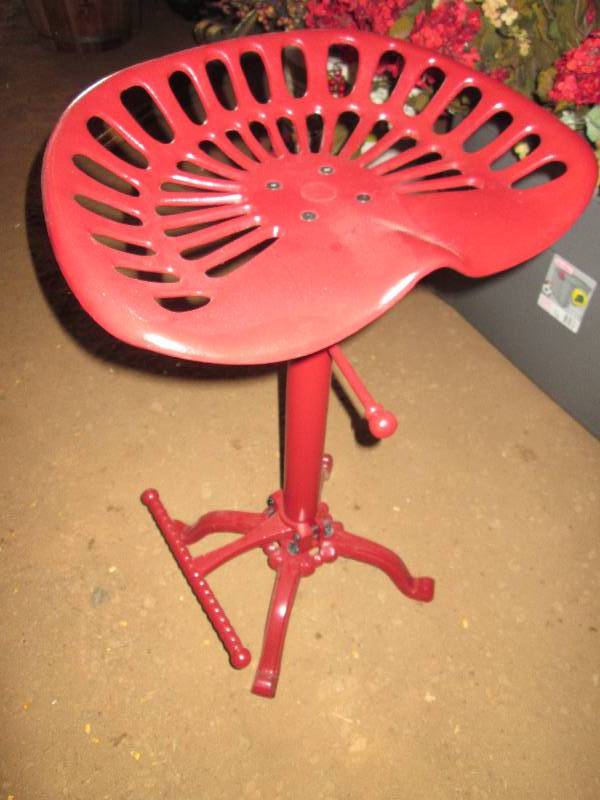 lot 52 image: Tractor seat bar stool...