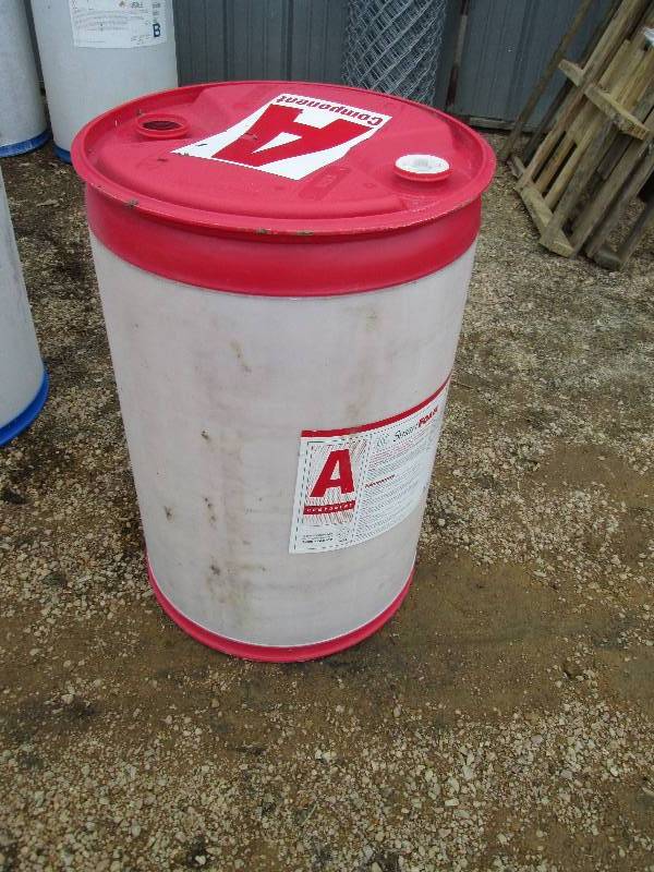 lot 74 image: Red plastic barrel very similar to ...