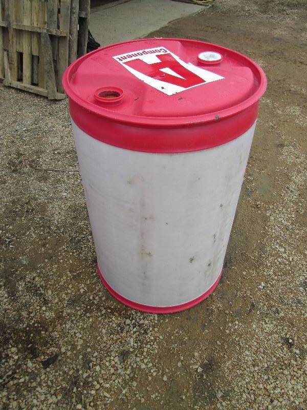 lot 75 image: Red plastic barrel very similar to ...