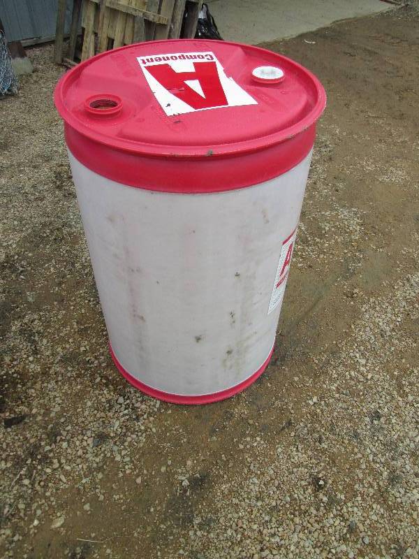 lot 80 image: Red plastic barrel very similar to ...