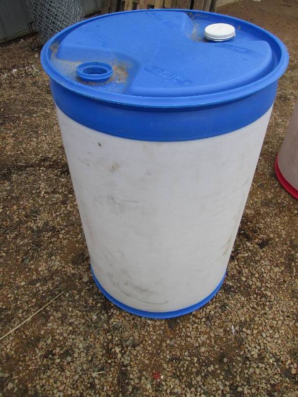 lot 82 image: Blue plastic barrel very similar to...