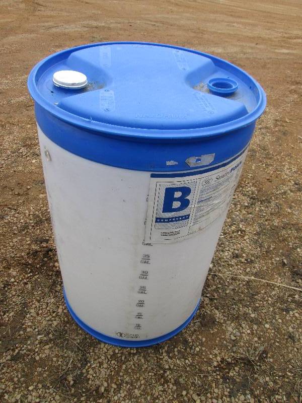 lot 84 image: Blue plastic barrel very similar to...