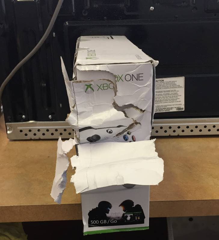 lot 36 image: New (Damaged Package) XBOX ONE halo collection bundle