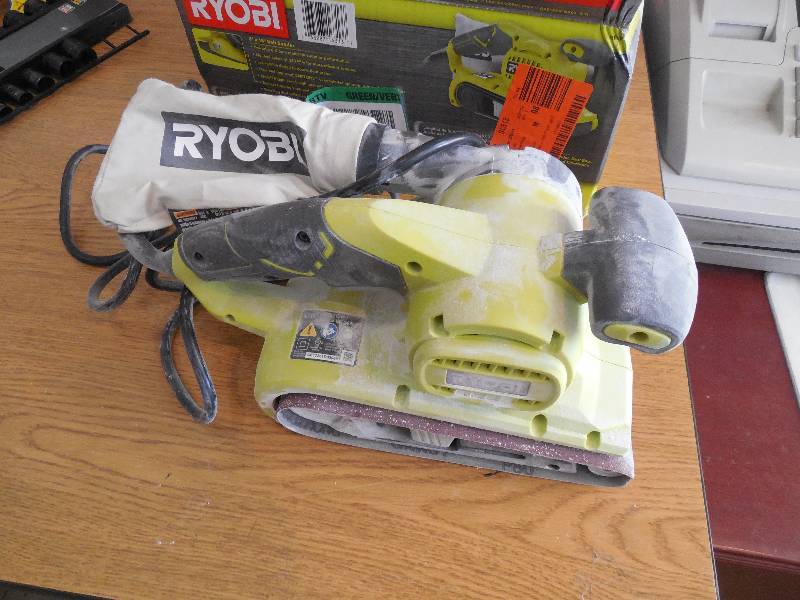 lot 22 image: Ryobi 3 in. x 18 in. Portable Belt Sander