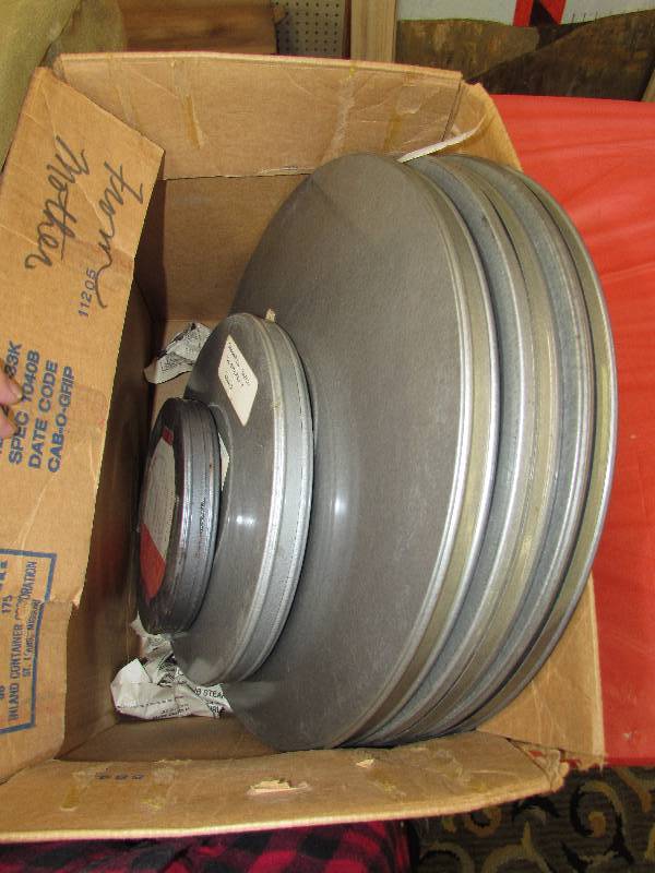 lot 383 image: 5 MOVIE REELS AND TINS