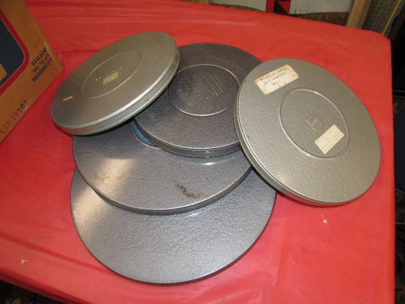 lot 386 image: 5 MOVIE REELS AND TINS