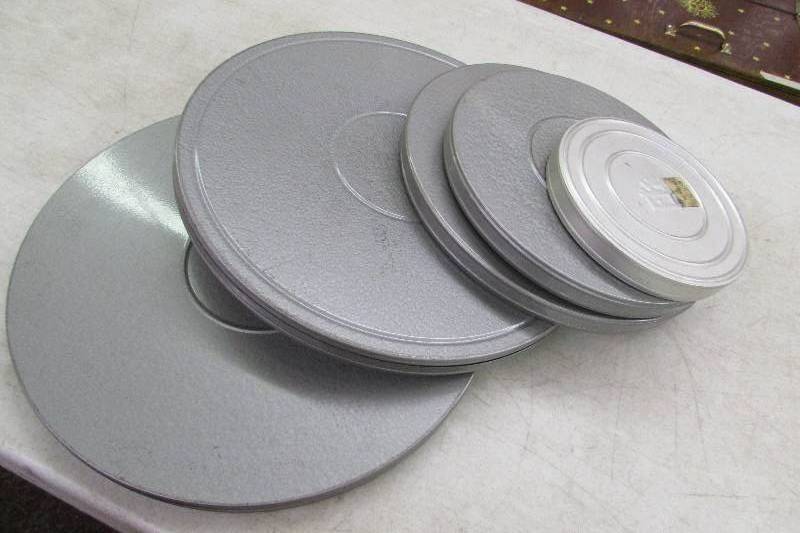lot 384 image: 5 MOVIE REELS AND TINS